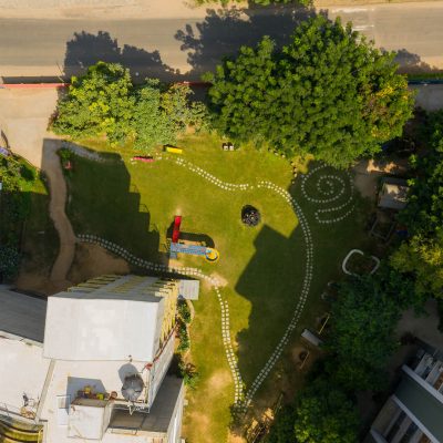 Aerial View of School Campus Playground Lawn and Pathways